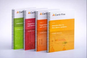 Certi-Fire coursebook series, Levels 1-4 displayed standing in an overlapping series.